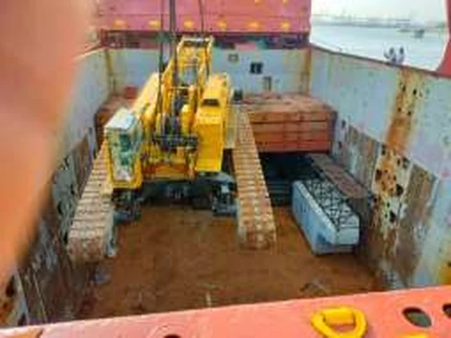 Heavy equipment handling inside a vessel